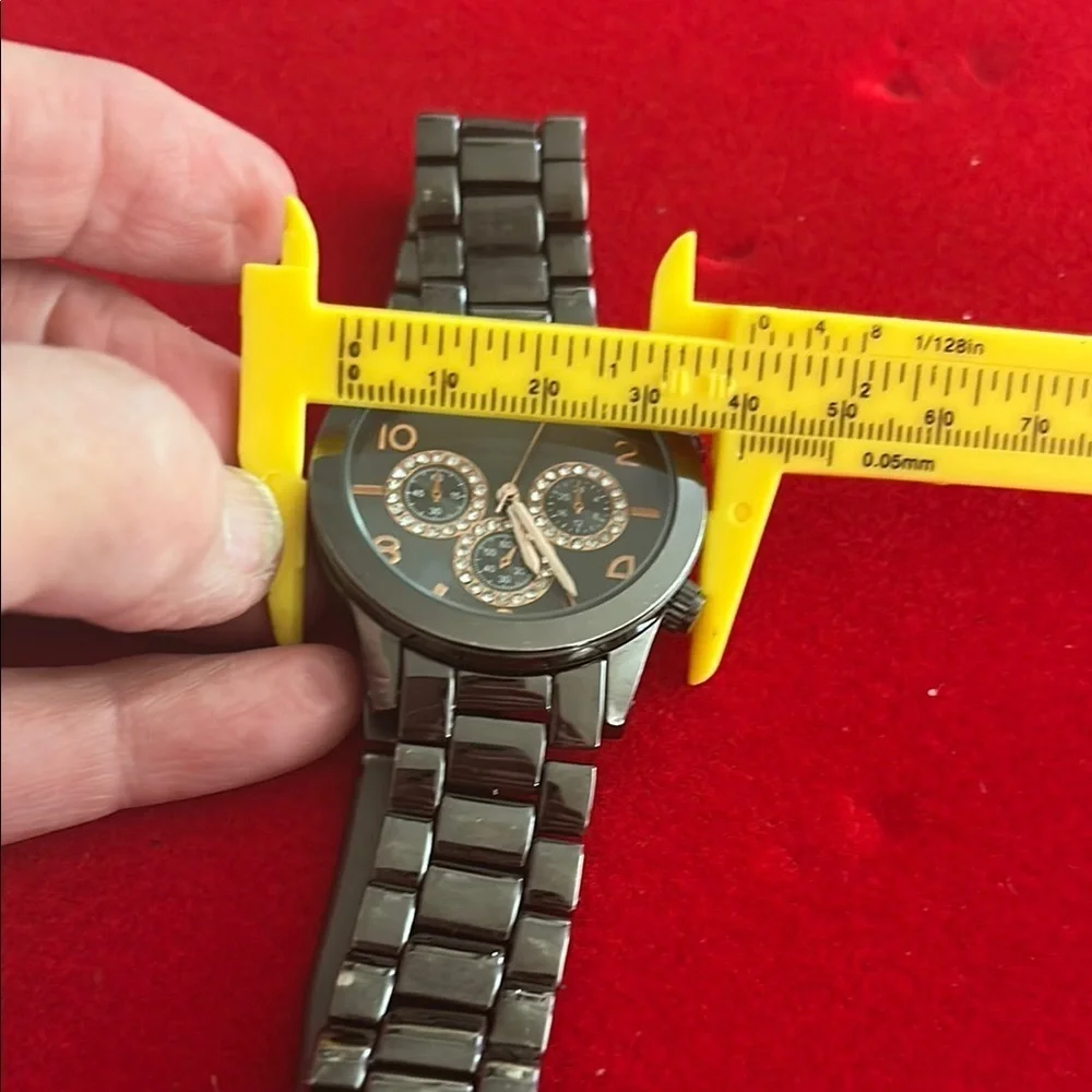 Black Metal Watch with Gold Accents